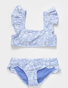 Raisins Hey Bae Bikini Set. This Two-Piece Set Combines Playful Details With A Blooming Floral Pattern For A Delightful Beach Or Poolside Look. Pullover Bralette Design. Adjustable Shoulder Straps Featuring Ruffle Detailing. Removeable Cups. Matching Bottoms Featuring Ruffle Trim. Full Bum Coverage. Fully Lined. 82% Nylon, 18% Spandex. Hand Wash. Imported. | Raisins Hey Bae Girls Bikini Set Appropriate Swimsuit, Preppy Bathing Suit, Preppy Swimsuit, Pretty Swimsuits, Summer Wishlist, Summer Bathing Suits, Preppy Stuff