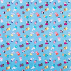 a blue fabric with cartoon characters on it