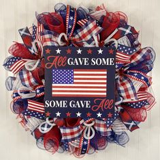 a patriotic wreath with the words all gave some, some gave all on it