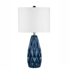 a blue table lamp with a white shade