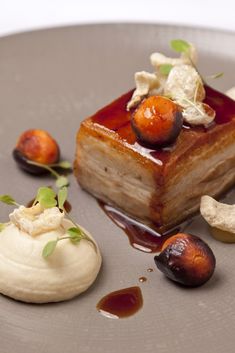 a plate with dessert and fruit on it