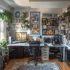 a home office with lots of pictures on the wall and desks in front of it