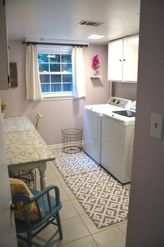 a laundry room with a washer and dryer