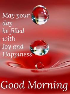 happy wednesday good morning with water drops on the surface and words below it that says, may your day be filled with joy and happiness