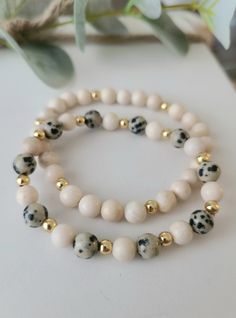 "▪️This custom beaded bracelet set includes: - 2 Dalmatian Jasper (Cheetah), Riverstone Fossil and Gold Filled bead bracelets. This leopard bracelet stack is gorgeous and literally matches everything! This neutral stack is timeless, classy and perfect for that minimalist look. ▪️These 6mm beads are hand strung on professional grade stretch cord. The tiny gold-filled gold beads are 4mm. They are beautiful, chic and are perfect for layering and stacking! 8mm bracelets COMING SOON Bracelet Sizing ⬇ Luxury Modern Beaded Bracelets With Round Beads, Leopard Bracelet, Stretchy Beaded Bracelet, Dalmatian Jasper, Diy Bracelet Designs, Beads Bracelet Design, Crystal Beads Bracelet, Beaded Bracelets Diy, Bracelets Handmade Beaded