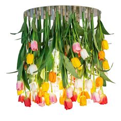 a chandelier with tulips hanging from it's sides and green leaves