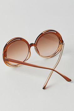 Add a vintage-inspired touch to your sunglass collection with this retro-inspired style featured in an oversized, round design with ombre frames and lenses for a forever perfect finish. | Wavy Baby Round Sunglasses by Free People in Brown Sunglass Collection, Round Design, Round Sunglass Women, Boho Clothing, Retro Inspired, Round Sunglasses, Espresso, High Fashion, Vintage Inspired