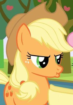 an animated pony with blonde hair and green eyes looking at something in front of her