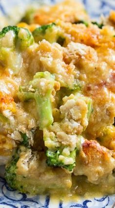 broccoli and chicken casserole on a blue and white plate