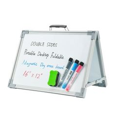 a white board with markers and markers on it, attached to a clipboard