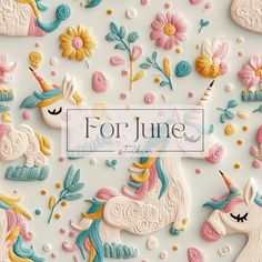 an image of some decorated cookies with flowers and unicorns on them for the title for june