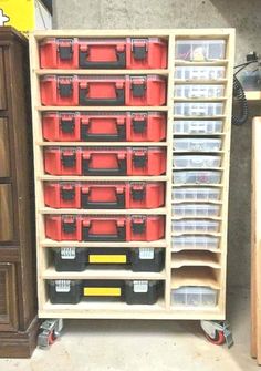 the shelves are filled with many different types of toolboxes and bins for storage