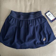 In Excellent Condition Navy Blue Color A60 Navy Skirted Skort, Navy Lined Skirted Skort, Navy Skirted Skort With Lined Skirt, Blue Fitted Sports Skirt, Sporty Short Blue Skirt, Navy Lined Tennis Skirt, Blue Casual Sports Skirt, Casual Blue Sports Skirt, Blue Mini Tennis Skirt With Elastic Waistband