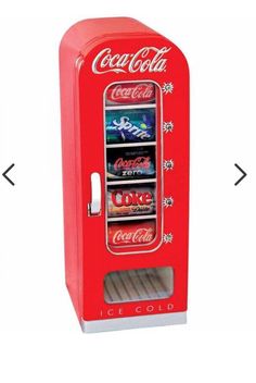 an old fashioned coca cola machine is shown