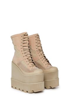 have adjustable lace-up closures, embroidered logo details, and pull tabs on the back. These wedge boots feature a double stacked platform design and a paneled faux suede and leather construction. Dolls Kill Platform Boots, Tan Platform Boots, Concert Boots, Wedge Platform Boots, Chunky Platform Boots, Rave Clothes, Platform Boots Chunky, Platform Design, Fishnet Top