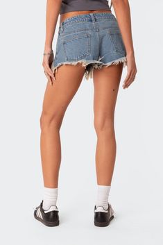 PRODUCT INFO Micro shorts Low rise waist Distressed detailing Denim fabric 100% Cotton Model wears size S Model height is 5'9 Item care: Wash with similar color Dark Wash Jean Shorts With Built-in Shorts, Denim Blue Bottoms With Built-in Shorts, Ripped High-waisted Jean Shorts In Dark Wash, Ripped Dark Wash High-waisted Jean Shorts, High Rise Relaxed Fit Shorts With Frayed Hem, Relaxed Fit High Rise Shorts With Frayed Hem, High Rise Shorts With Frayed Hem And Relaxed Fit, Relaxed Fit Shorts With Frayed Hem, High-waisted Shorts With Frayed Hem And Relaxed Fit