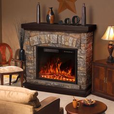 a living room filled with furniture and a fire place in the middle of the room