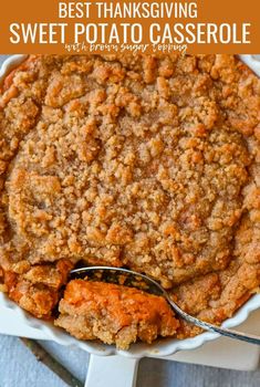 the best thanksgiving sweet potato casserole is in a white dish with a spoon