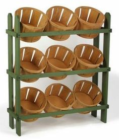 three tiered shelf with baskets on each side and oranges in the bottom basket