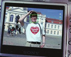 a man is standing in front of a camera