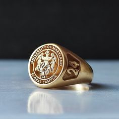 It is personal. I can produce any family crest, university, college, graduation and logo. Special jewelry for men and women. Deep and detailed hand craftsmanship. ❓ Material options: 925 sterling silver 10K - 14K - 18K - 22K Pure Gold --------------- Small - 12mm*12mm Medium - 15mm*15mm Large - 18mm*18mm --------------- ❓❓ How can I place my order: 1- Select the product you want 2- Create your order and fill in the personalization field 3- If you have a picture of your logo, send it to me via message. If you want your stones to change color, let me know. After placing your order, I will custom design your design and send you a confirmation message. We can make changes there, or you can give your approval there to go into production. ❗ Important information: *The back of the ring is solid. Graduation Rings College, High School Rings, Class Rings College, College Ring, University Rings, School Rings, College Rings, College Class, Ring Plate