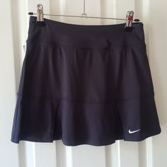 Never Worn! Nike Dri-Fit Charcoal Gray Running Or Tennis Skort. Front And Back Are Pleated For Extra Room. Built In Shorts For Comfort. Never Worn But Tags Are Missing, It's Been Hanging In My Spare Closet. Nike Fitted Tennis Skirt, Fitted Nike Pleated Skirt, Nike Casual Skirted Skort, Nike Fitted Skirt, Nike Pleated Skirt Fitted Bottoms, Nike Fitted Casual Skirt, Casual Nike Fitted Tennis Skirt, Fitted Nike Skirt, Casual Fitted Nike Skirt