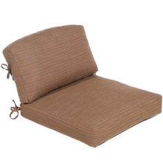 an outdoor chair cushion with ties on it