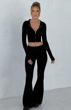 The Portia Knit Pants are a must-have for any wardrobe. These versatile pants feature a flattering fit and flare silhouette, with a wide rib waistband for added style. Complete the look with the matching Portia knit hoodie. 



Colour: Black.

Regular length.

Unlined.

Fit and flare silhouette.

Wide 2x2 rib waistband.

Fold over waistband detail.

Internal elastic in waistband.

Model is an XS and is wearing an XS.

 Size: XS, S, M, L, XL, XXL Fit And Flare Silhouette, Pink Sweatsuit, Homecoming Dresses Corset, White Dress Spring, Long Sleeve Bridesmaid Dress, Split Long Dress, Maxi Dress Sale, Popular Dresses, Sparkle Dress