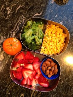 what's in your kids lunch? with strawberries, broccoli, and oranges