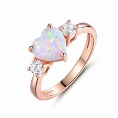 Pink Simulated Opal Cubic Zirconia Heart Ring Rose-Gold Plated Sterling Silver Size 7. Our Silver Jewelry Is Made From Sterling Silver. Sterling Silver Is A Mixture Of High-Quality 92.5% Or Higher Pure Silver With Alloys To Add Strength And Ability To Withstand Time And Wear. All Our Items Have A 925 Stamp Referring To The Silver Purity That Was Used When Crafted. Please Note: The 925 Stamp Location May Vary, Depends On The Item. Made Of Real 925 Sterling Silver With Rose Gold-Tone Plating. Ston Pink Promise Ring, Promise Ring For Girlfriend, Sparkling Engagement Rings, Ring For Girlfriend, Opal Heart Ring, Opal Promise Ring, Pink Gold Rings, Ring Rosegold, Tiffany Jewelry