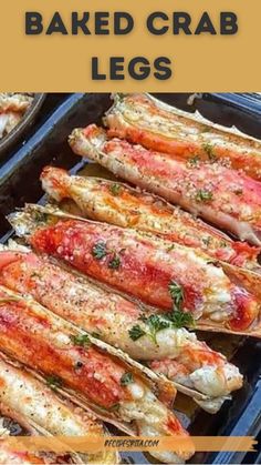 baked crab legs with parsley on top and in the background text reads baked crab legs