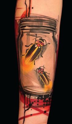 a jar with two bugs in it on the left arm and an ink splotter