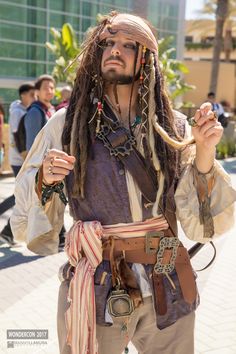 a man dressed in pirate costume with dreadlocks