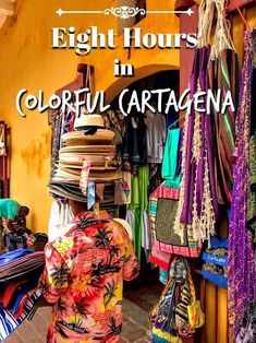 a woman standing in front of a store filled with colorful items