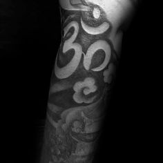 black and white photo of a man's arm with numbers on it