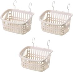 three white plastic laundry baskets hanging from hooks