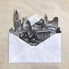 an envelope with the image of a city in it