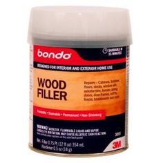 a can of wood filler on a white background