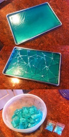 some blue and green glass sitting on top of a wooden table next to a bowl