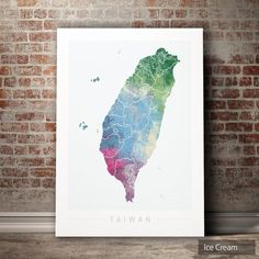 a watercolor map of taiwan is shown in front of a brick wall