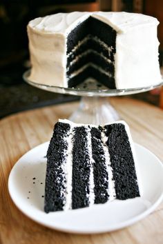 a slice of black and white cake on a plate