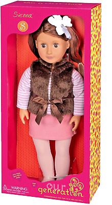 a doll in a pink box with a brown vest