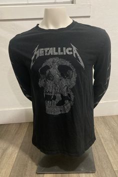 METALLICA pushead skull long sleeve shirt color black, crew neck METALLICA skull print on the front. men's size Large 21x27 inches pre-owned with one small hole on the front but still in good condition Long Sleeve Black Shirt, Clothing Finds, Skull Shirt, Black Long Sleeve Shirt, Skull Shirts, Skull Print, Shirt Long Sleeve, Shirt Color, Black Men