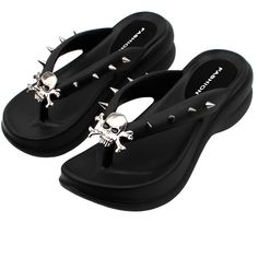 Go to the party with our Black Wedge Heel Flip Flops adorned with bewitching Halloween pins. These unique flip flops blend comfort and chic, featuring a sleek black design that effortlessly complements any outfit. The wedge heel adds a touch of elegance while ensuring all-day comfort. Plus, our exclusive Halloween pins add a playful twist, allowing you to customize your look for the season's festivities. Step into the spirit of Halloween fashion with these versatile and eye-catching wedge heel s Goth Flip Flops, Goth Sandals, Heel Flip Flops, Halloween Skulls, Heeled Flip Flops, Halloween Pins, Room Stuff, Wedge Flip Flops, Black Wedge