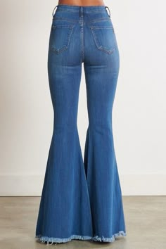 Carson Distressed Flares Ladies high rise extreme flare distressed bell bottoms with just the right amount of distressing. True to size Model is 5'2" wearing a size 1 60% Cotton, 32% Modal, 7% T400, 1% Lycra 13" Rise, 34" Inseam Size Waist Hip 1 24 33 3 25 35 5 26 37 7 27 38 9 22 40 11 29 41 13 30 42 15 31 43 Edgy Jeans, Distressed Flare Jeans, Rush Dresses, High Waisted Flares, Country Outfits, High Rise Jeans, Look Cool, Western Wear, Bell Bottoms