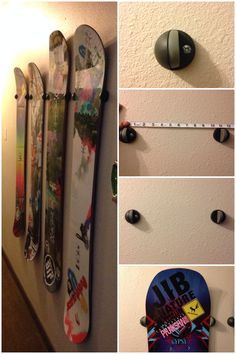 there are several pictures of snowboards on the wall and one has a measuring tape