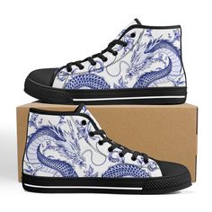 These Blue Dragon Blue Ceramic Black high top canvas shoes are ideal for being unique and standing out from the rest of the crowd. To be Gnarly, you need to be different and feel different. These shoes will help you express yourself through the intricate art and gnarly design it displays. This unique shoe is hand drawn/designed in the USA and built with fantastic quality. CONSTRUCTION: Our shoes are very well constructed with quality stitching and a solid base. They are comfortable and durable and suitable for most occasions. HANDCRAFTED DESIGN: Wearing these shoes is making a statement. Our shoes have bold and gnarly designs that fit anyone who want to separate themselves from the rest. The designs are inspired by art and beauty from around the world. Exclusively designed in the USA. __FE Blue High-top Canvas Shoes, Dragon Blue, Unique Shoe, Black High Top Converse, Intricate Art, High Top Converse, Converse Style, Black And White Shoes, Cute Sneakers