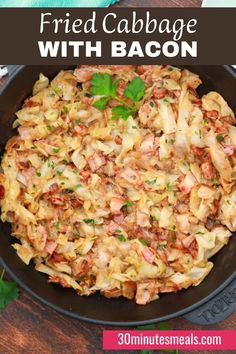 a skillet filled with cooked cabbage and bacon