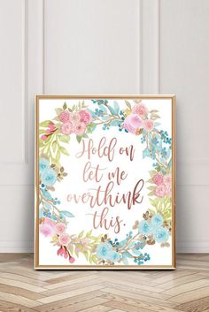 a floral print with the words, hold on let me overthik this in gold foil