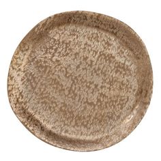 a brown plate with speckles on it